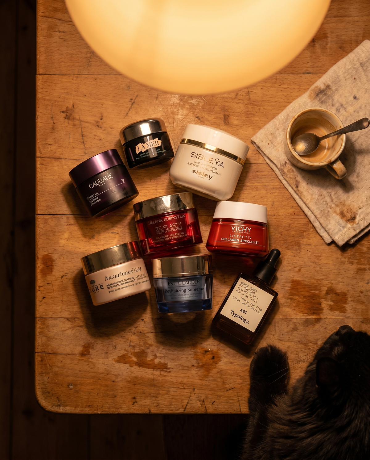 A drawer full of half-used skincare jars and a crumpled receipt